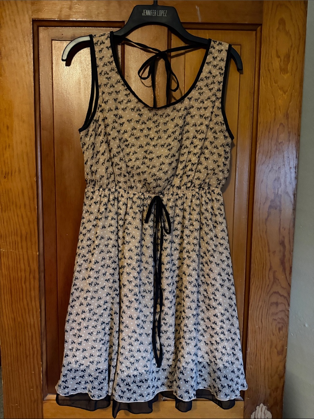 Rosebud light tan dress with navy trim